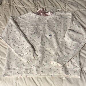 Hollister Off-Shoulder Sweater with Pink Floral Design